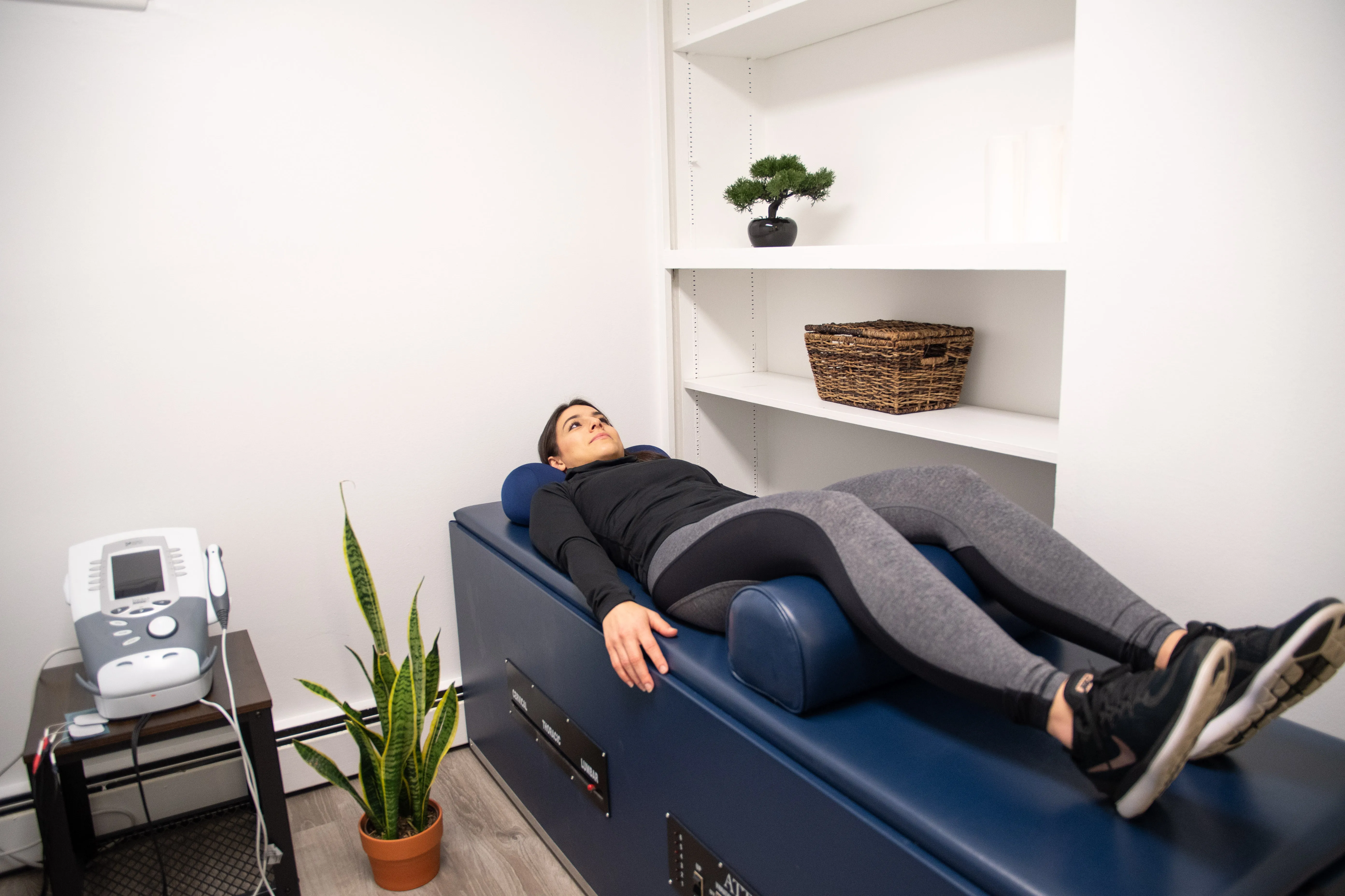 Spinal decompression and stretching recovery session for neck pain after long travel at District Wellness Arlington VA